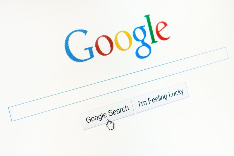 Google homepage with cursor over "Google Search" button.