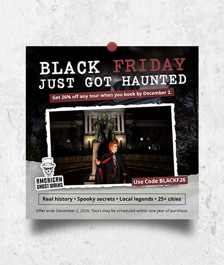 American Ghost Walks ad “Black Friday Just Got Haunted”: a caped guide in front of a lit monument at night